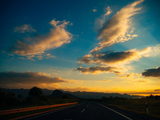 The road at sunset. View from the car. Highways in Croatia.