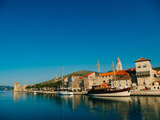 Fototapeta na wymiar Mooring for yachts near the old town of Trogir, Croatia.