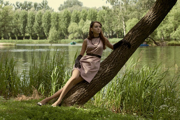beautiful vintage woman in summer park