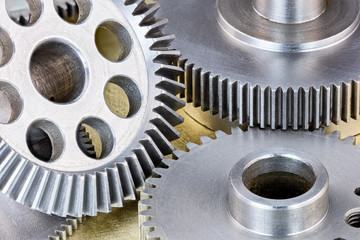 metal scratched industrial gear cogwheels closeup