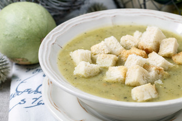 Creamy vegetable soup with croutons