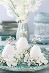 Easter floral decoration with goose egg