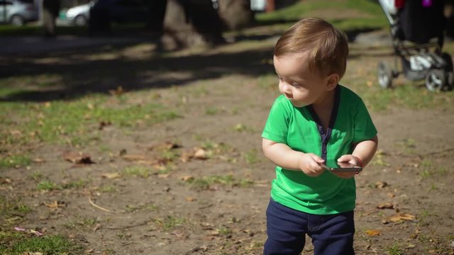 Adorable baby stops calling with cell phone