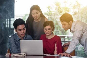 4 people meeting in coffee shop, business casual conceptual