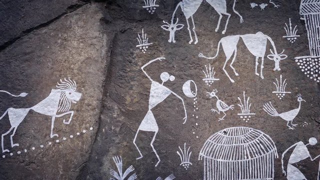 Pan Across Native Art On Rock Face