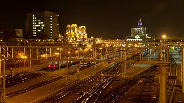 Minsk railway station at night. Dolly, time lapse shot in motion