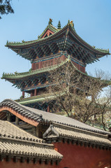 Fototapeta premium China, the Shaolin Monastery./China, the Shaolin Monastery. One of the watch towers of the monastery for more than thirty meters in height.