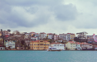 Naklejka na ściany i meble View of Istanbul and Bosphorus, Turkey. Sea front town houses