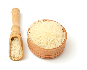 rice on wood plate isolated on white background
