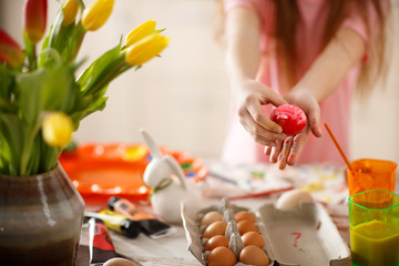 Easter egg on hand, concept