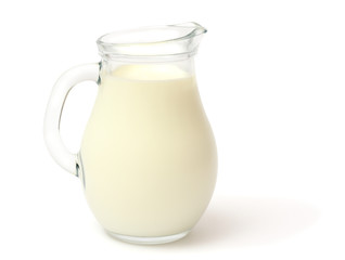 Glass jug pitcher of fresh milk isolated on white background carafe