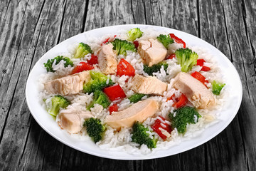 fried vegetables and boiled chicken breast