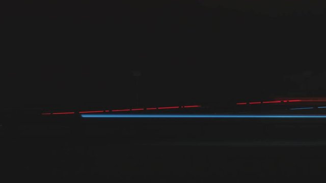 Super fast car lights in minimal style. Motion time lapse colorful urban background texture. Modern cityscape road traffic. Travel concept. Science hyperspeed  teleport movement. Time machine.