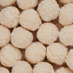 Pile of homemade sweets. Toffee and coconut balls