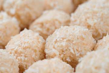 Pile of homemade sweets. Toffee and coconut balls