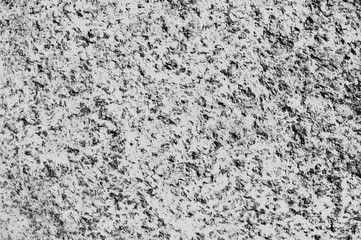Rough texture stone, black-and-white photo.