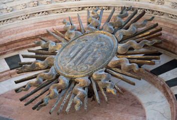 Solar disc at the entrance to the Duomo, Siena, Italy