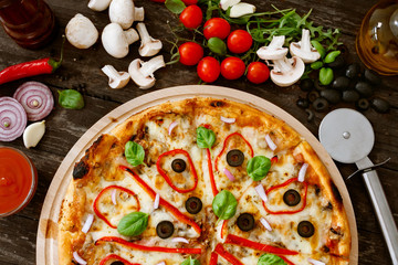pizza served on wooden table. Traditional Italian cuisine.