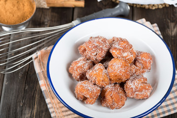 Homemade fritters with sugar