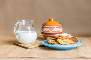 pancakes with jam, sour cream and milk