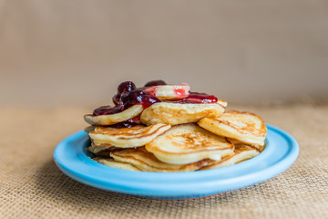 pancakes with jam, sour cream and milk