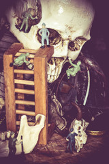 macro of miniature figurine of people , explore