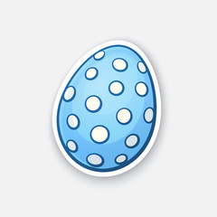 Vector illustration. Blue Easter egg with dotted pattern. Sticker in cartoon style with contour. Decoration for greeting cards, patches, prints for clothes, badges, posters, emblems