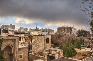 Fototapeta premium Panoramic view on Baku city and Flame Towers from Old City in Baku, Capital of Azerbaijan Republic
