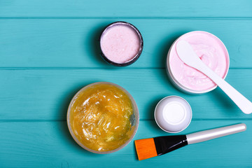 various cosmetics: cream, gel, brush, cosmetic spatul