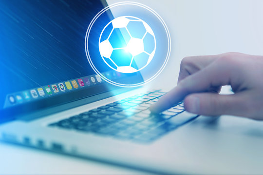 Soccer ball icon over device - Sport and technology concept