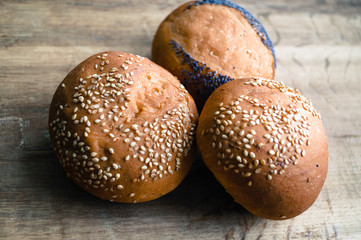 round loaves are with a poppy and sesame 