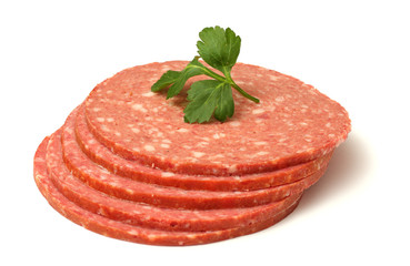 sliced red salami isolated on white background