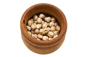 Wooden bowl with chickpeas isolated