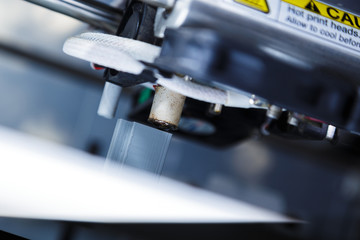 Fototapeta na wymiar Modern 3d printer. Close-up of process printing