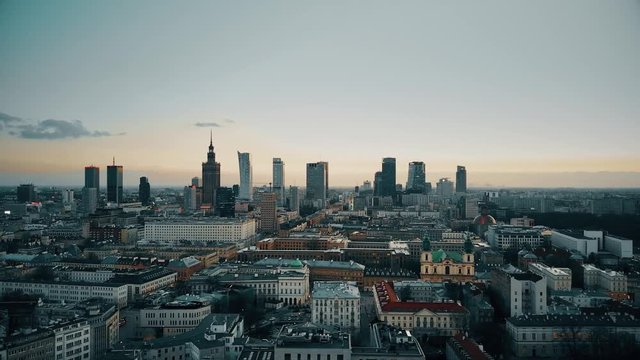 Establishing aerial shot of Warsaw downtown in the evening, Poland. 4K video