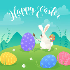 Happy Easter greeting card with white cute bunnies drawing on colorful eggs. Fun illustration of rabbits and eggs on grass and Happy Easter text.