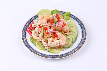 Spicy sour carp eggs of silver barb fish salad
