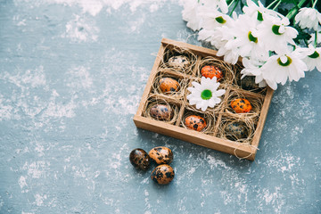 Colored eggs for Easter feast in aged Wooden box