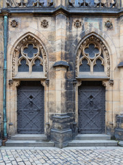 Fototapeta na wymiar Ornamental doorway of the Gothic Cathedral of Saints Vitus, Prague Castle, Czech Republic