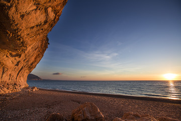 Views of sunrise in Cala Luna beach, Ogliastra, Sardinia