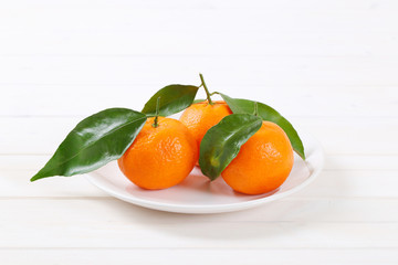 fresh tangerines with leaves