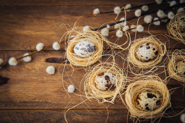 Easter yellow decorations over wooden background 