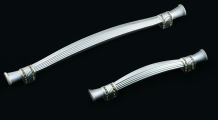 fittings for furniture. Handles for cabinets on a black background