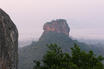 Fototapeta na wymiar Sunrise over the Lion rock, Sigiriya, Sri Lanka