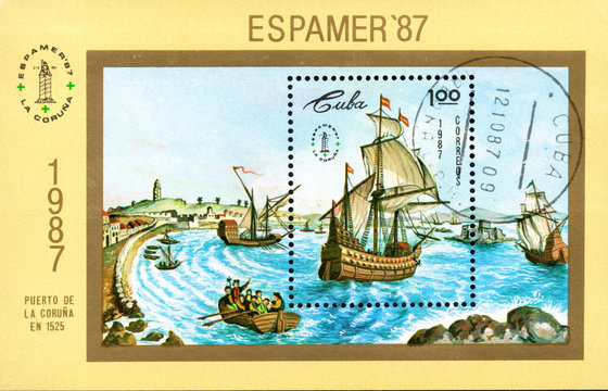 A stamp printed in Cuba shows image wind-driven ships in port of La Coruna in 1525, Espamer '87 Stamp Exhibition, circa 1987