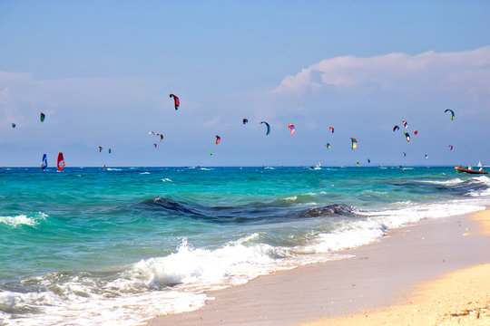 Kiteboarding in sunny day