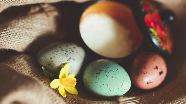 easter eggs on the rustic sackcloth background
