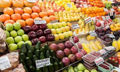 A variety of fruits and berries on the counter on the market. Russia, Saratov.