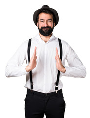 Hipster man with beard holding something