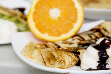 crepes and pancakes freshly made with chocolate and orange